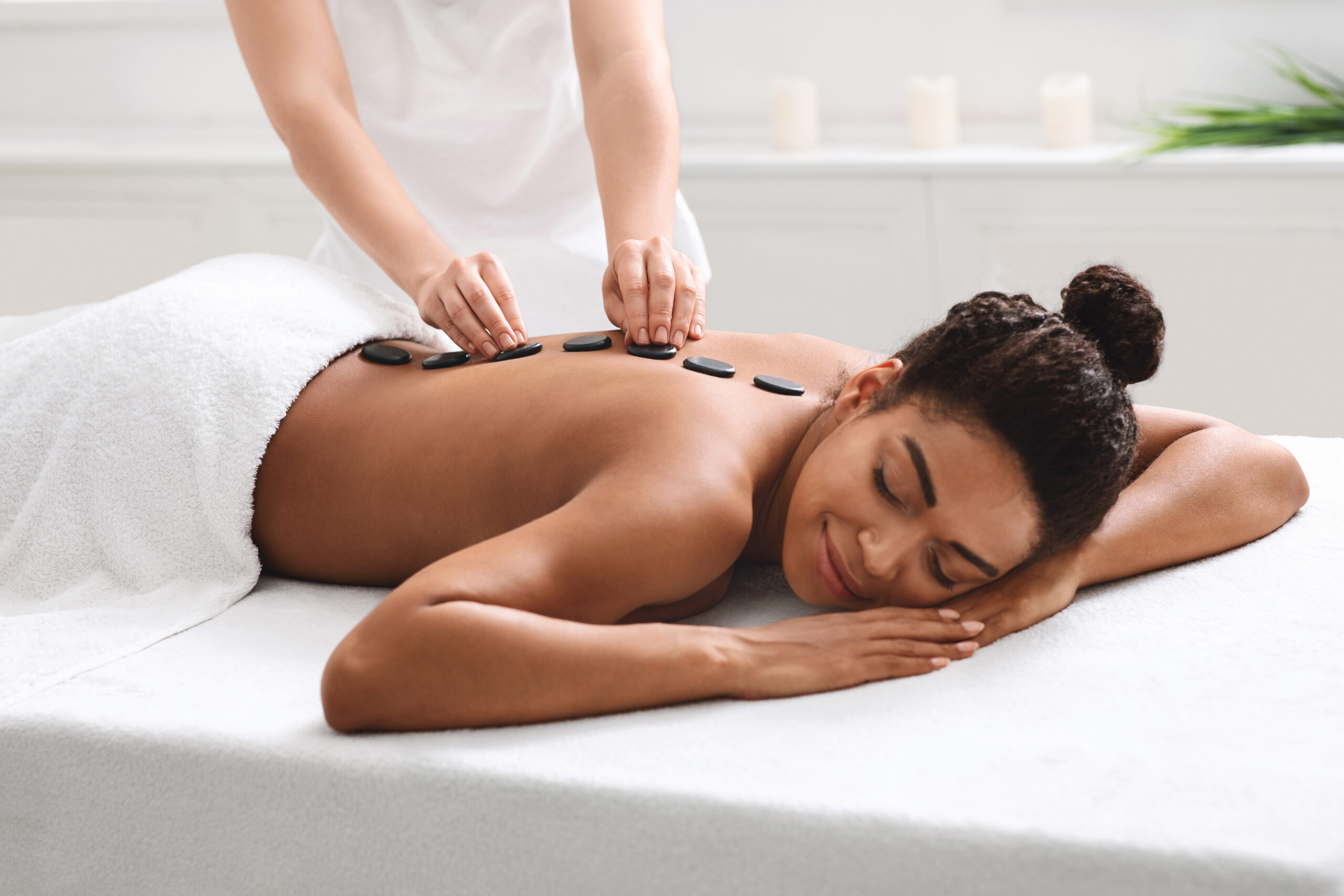 How Hot Stone Therapy Can Melt Away Muscle Tension